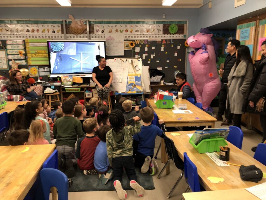 Principal does a classroom visit in an inflatable costume