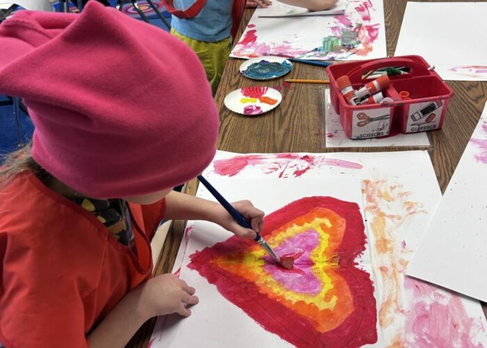 Children painting hearts